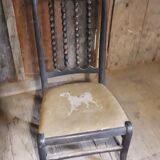 1900s Chair with drawing of an embroidered hunting dog and wooden beads