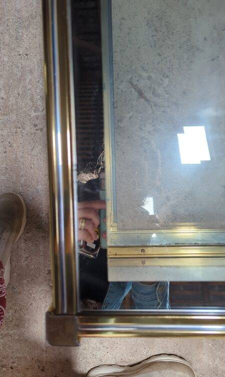 Vintage display coffee table in gilded brass and glass with a lock.