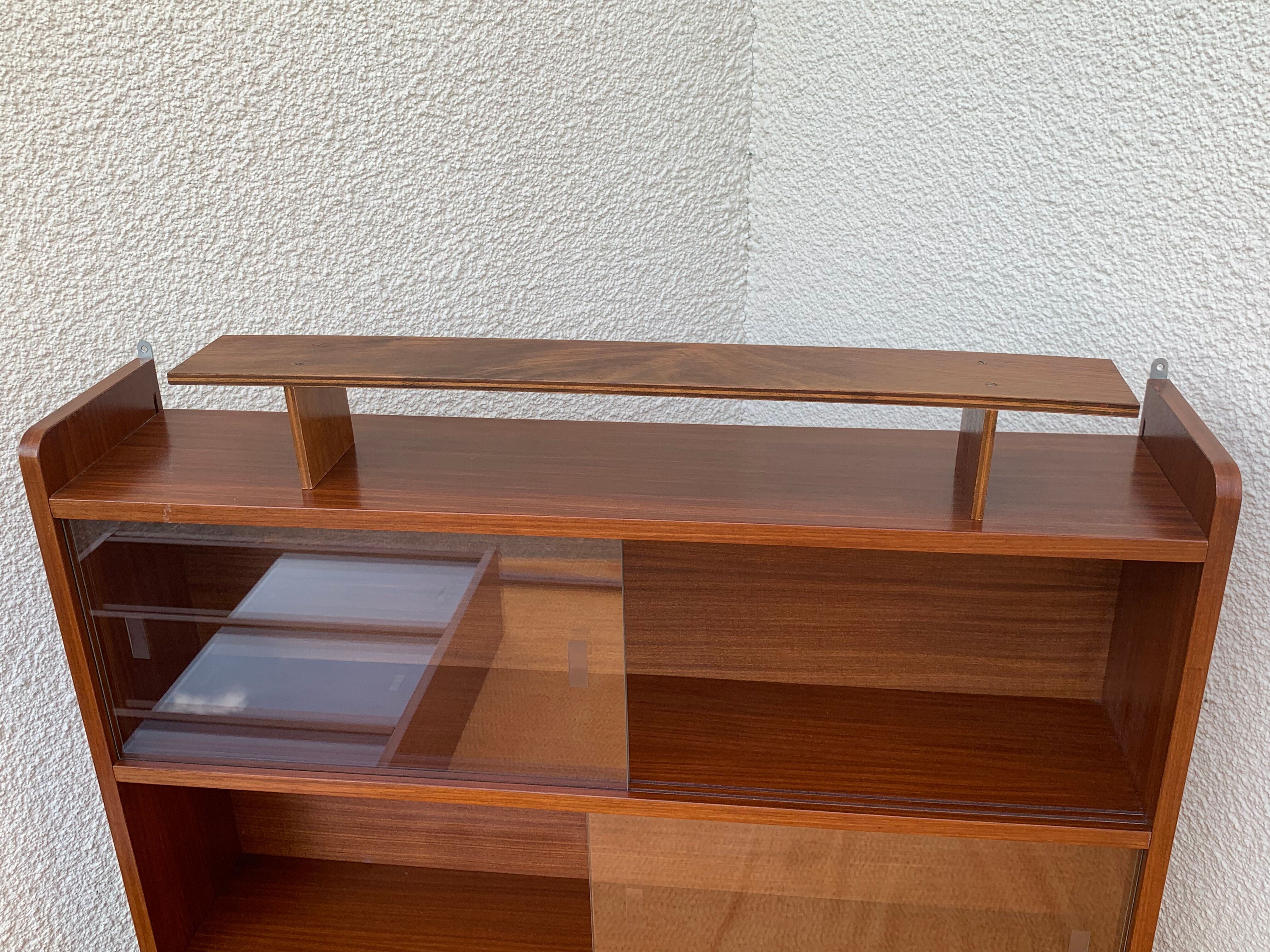 glass wall bookcase in vintage teak 1950