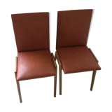 Red vintage chairs and compass feet