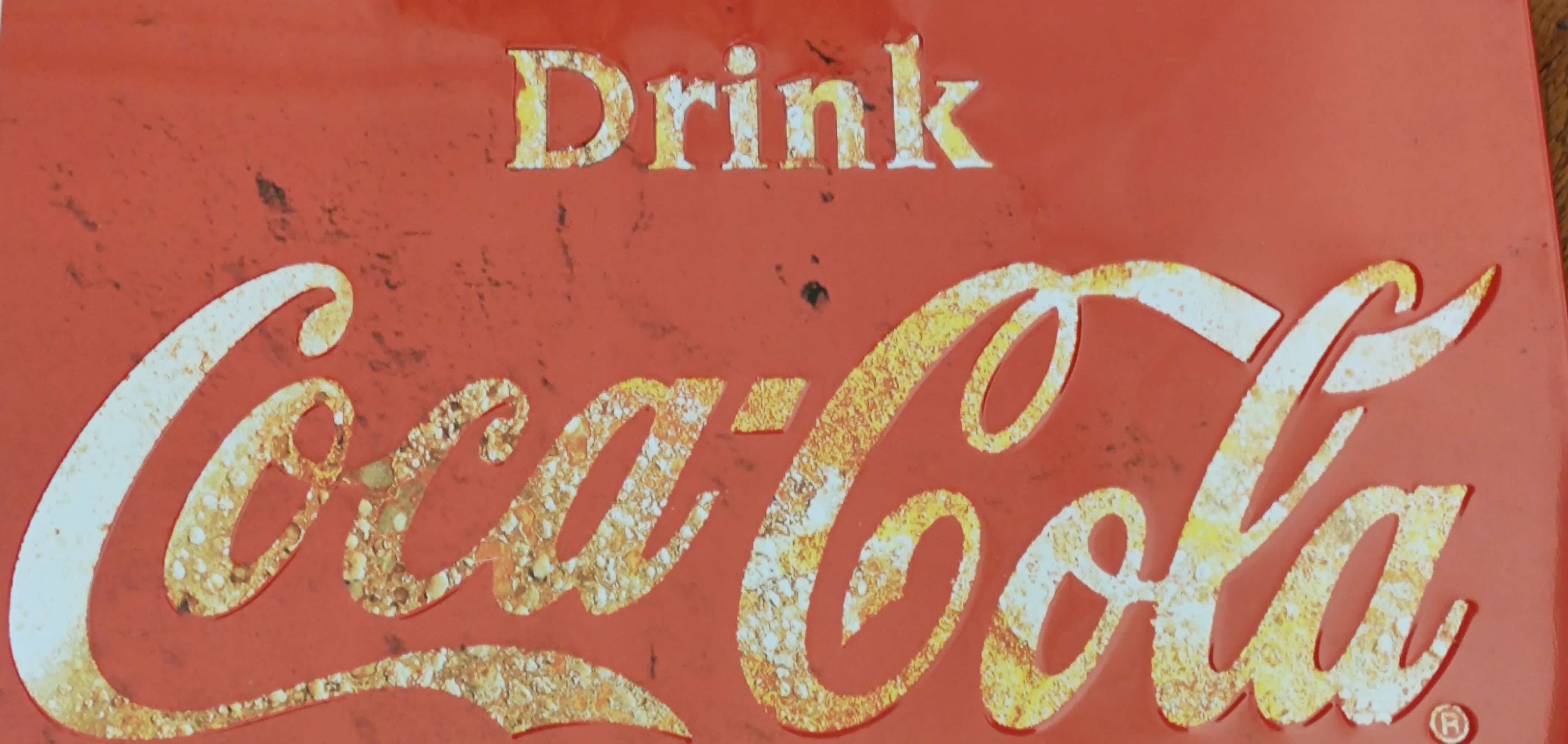 Vintage Coca Cola advertising plaque