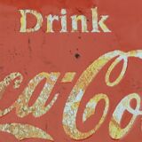 Vintage Coca Cola advertising plaque