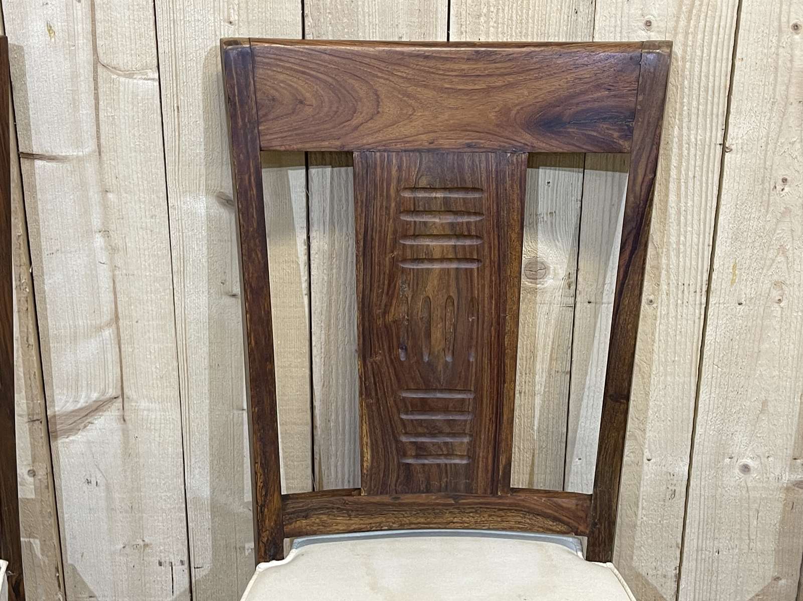 Suite of 4 teak chairs, Indian manufacture of the 1980s