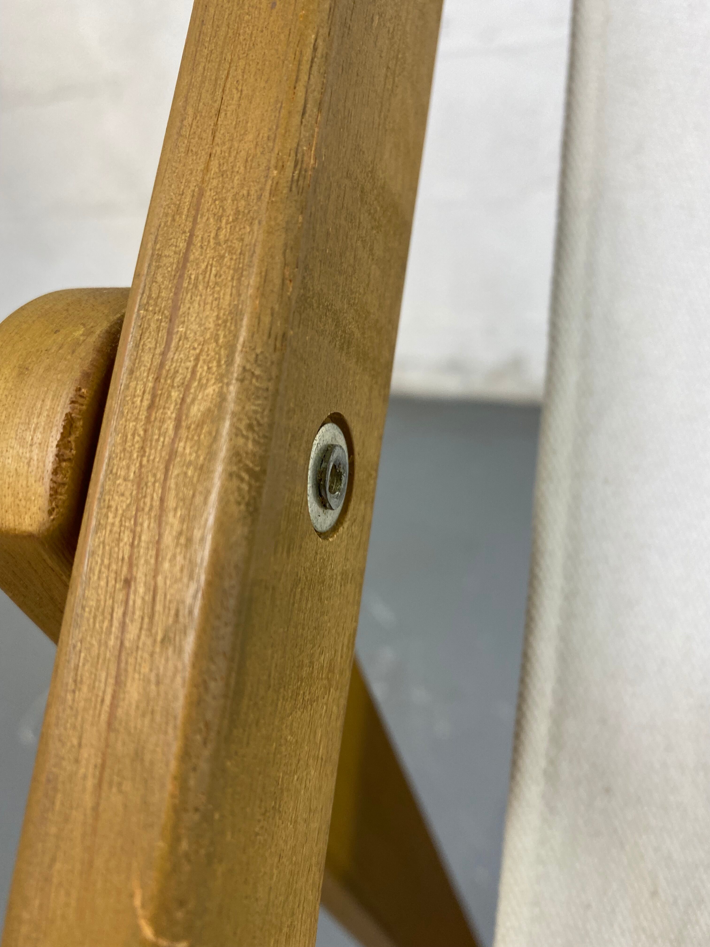 White fabric deckchair with wooden structure