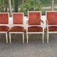 2 Louis XVI armchairs in solid wood and orange velvet.