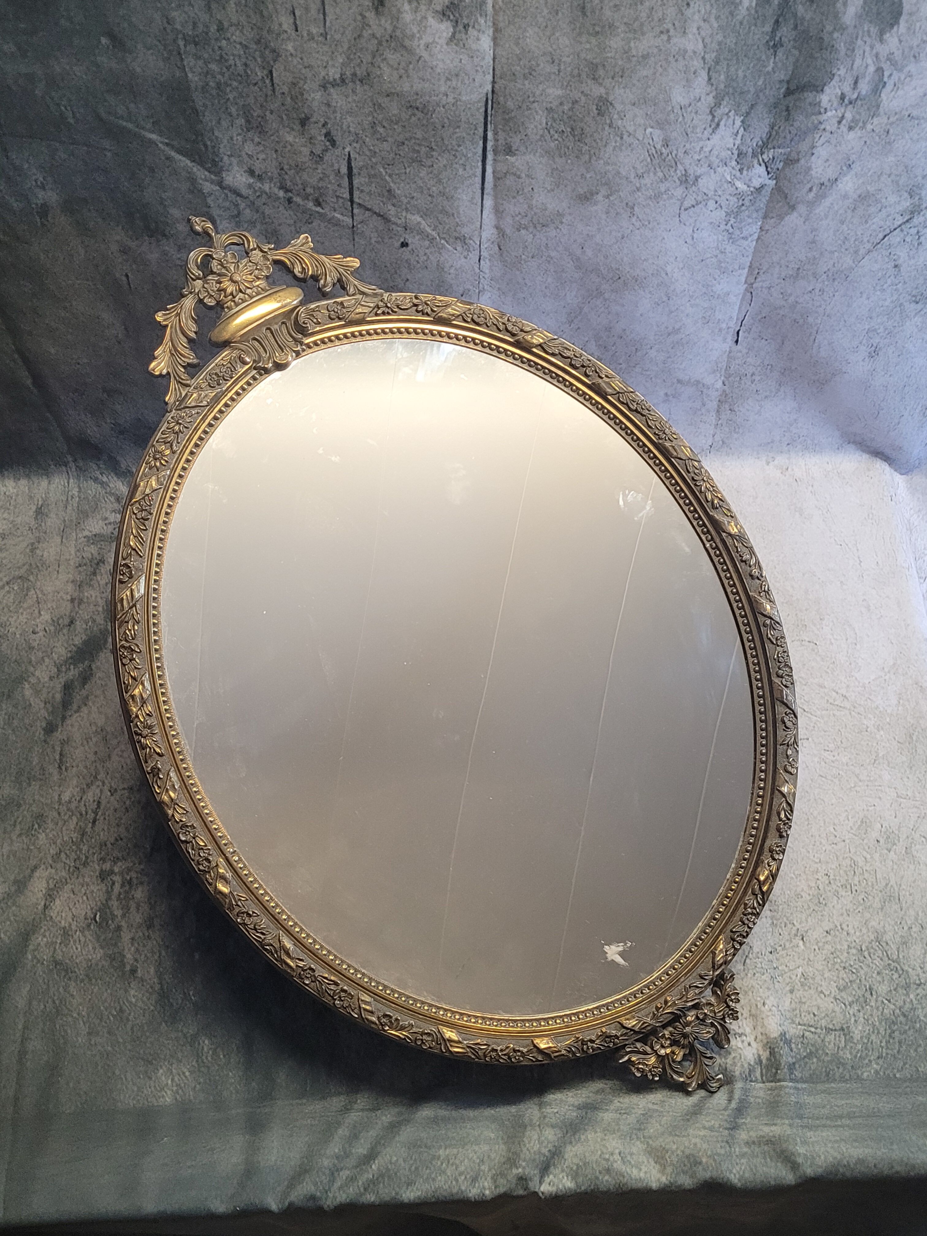 Gilded metal mirror in Louis XV style
