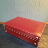 Red leather suitcase