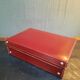 Red leather suitcase