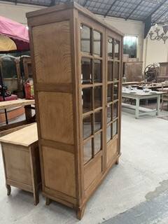 oak two-door display cabinet