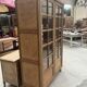 oak two-door display cabinet