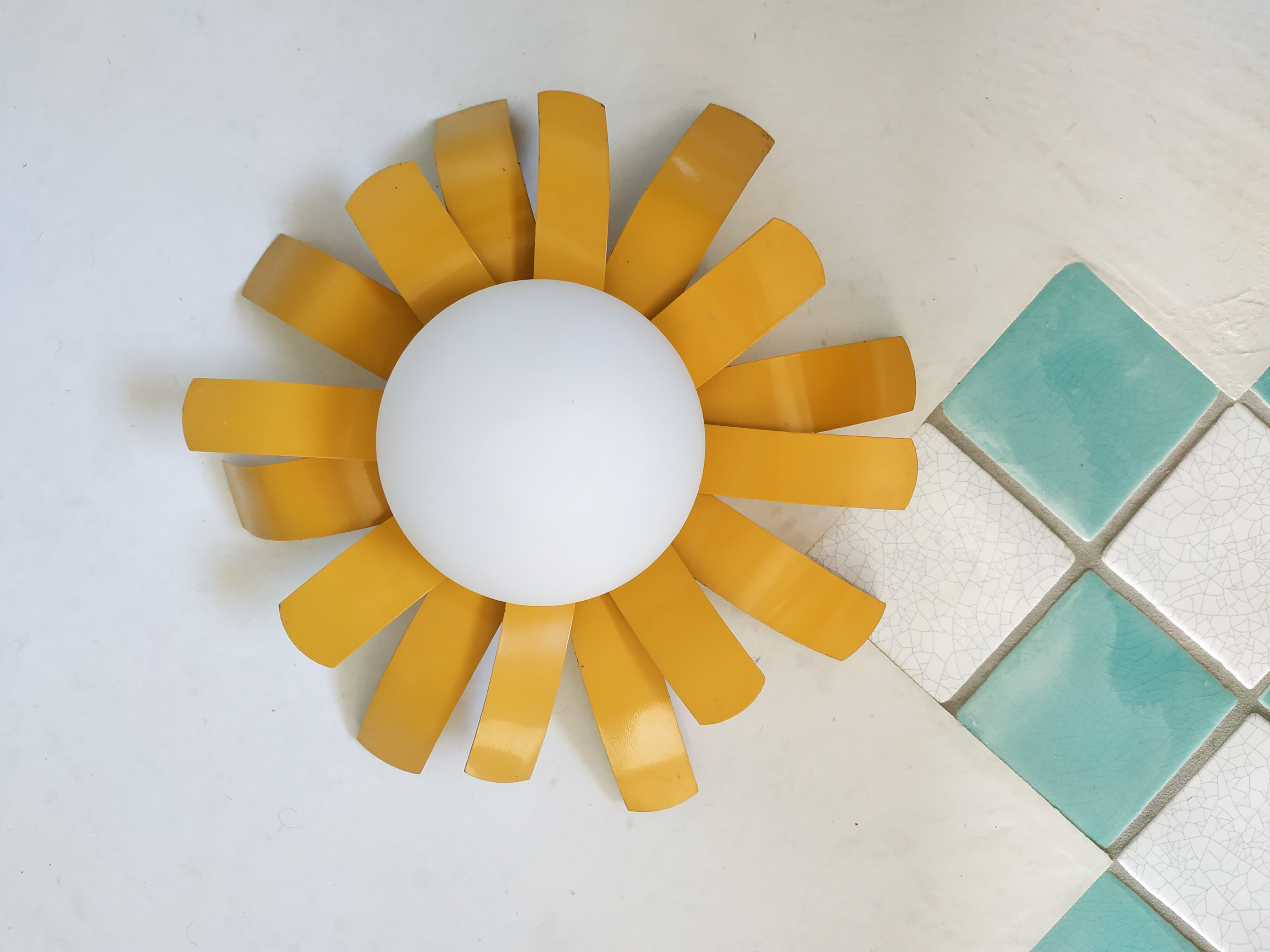 Wall light  ingold yellow metal and opaline sun