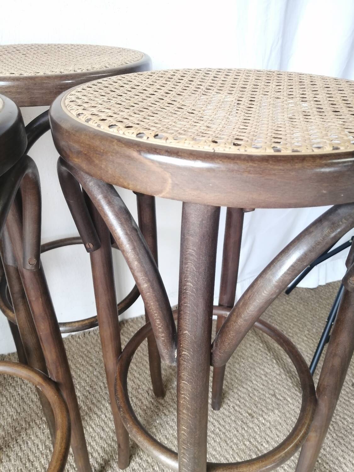 Set of 4 high bistro stools in curved wood and canework.