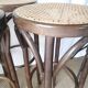 Set of 4 high bistro stools in curved wood and canework.