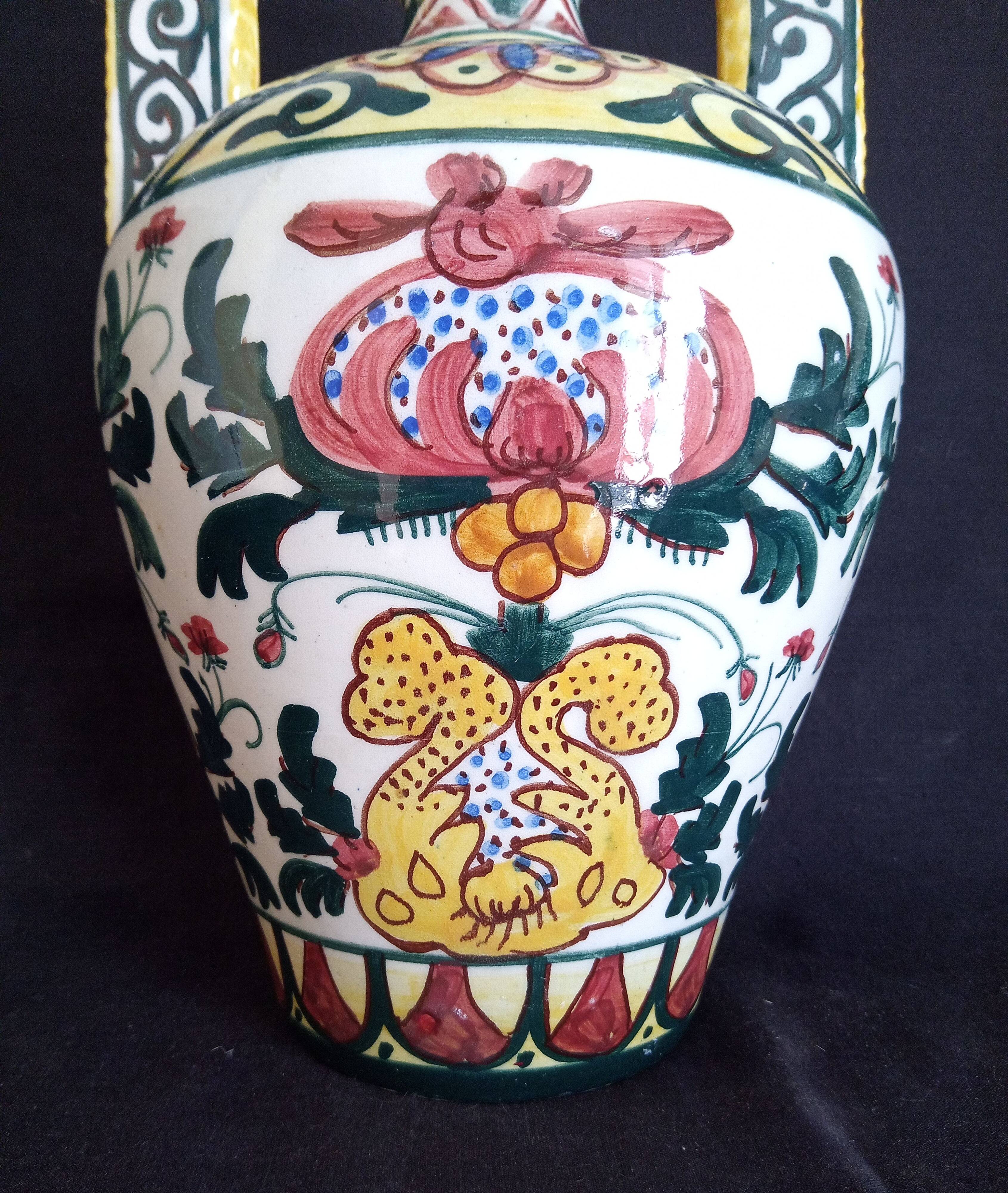 Art Deco ceramic vase with brightly colored abstract patterns