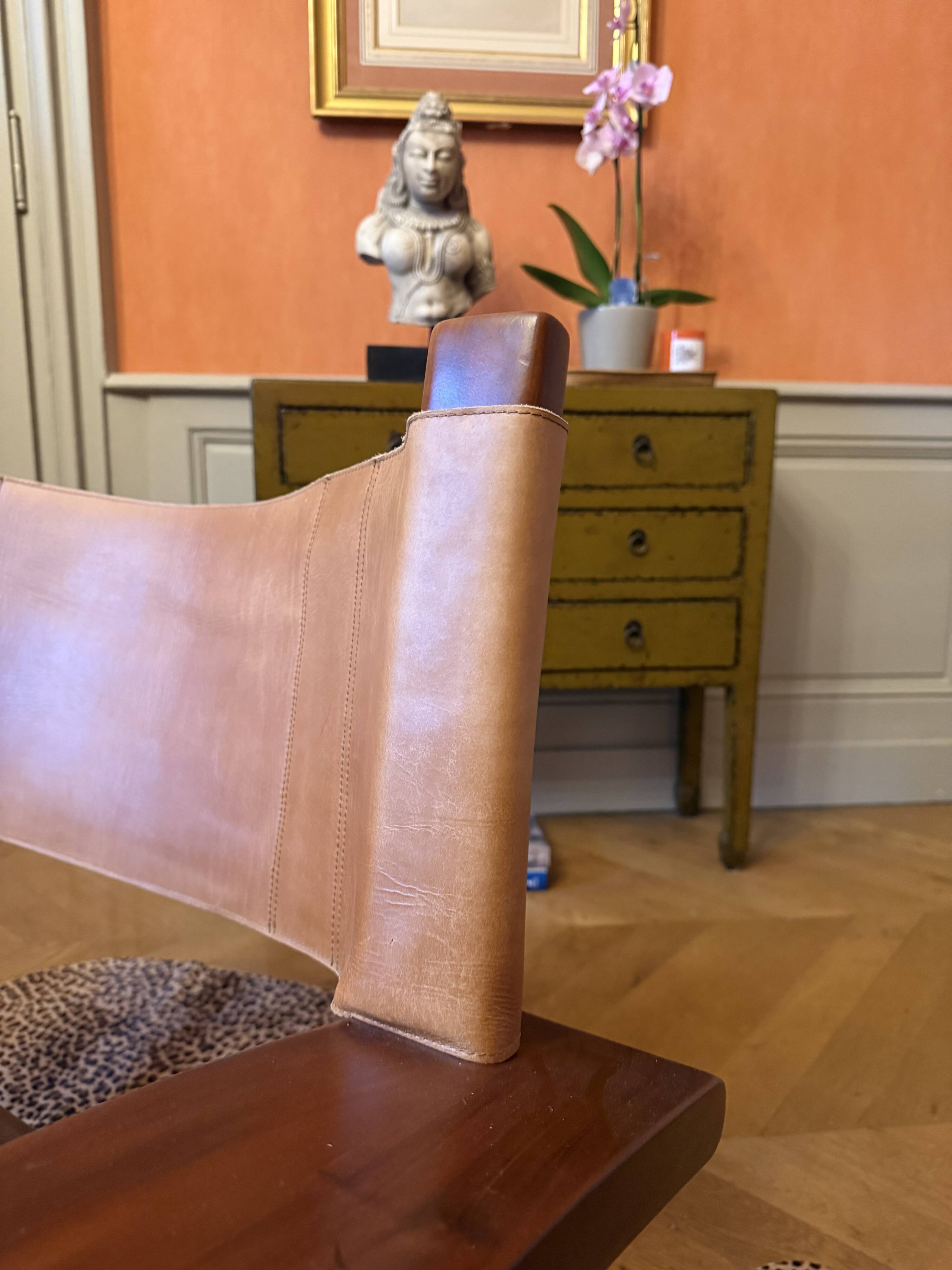 Wood and leather armchair