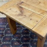Cherry wood coffee table with sliding top, work from the 70s