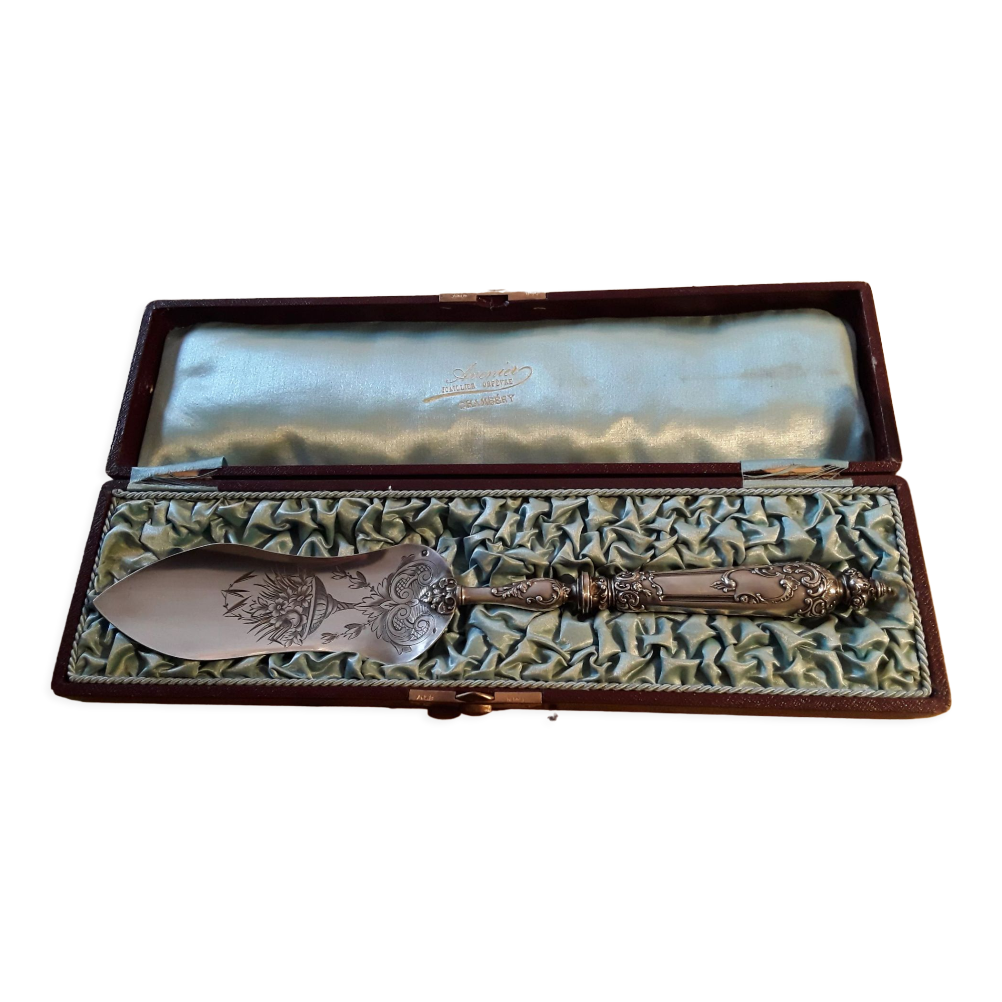 Filled silver pie shovel