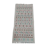 White carpet with multicolored Berber patterns handmade