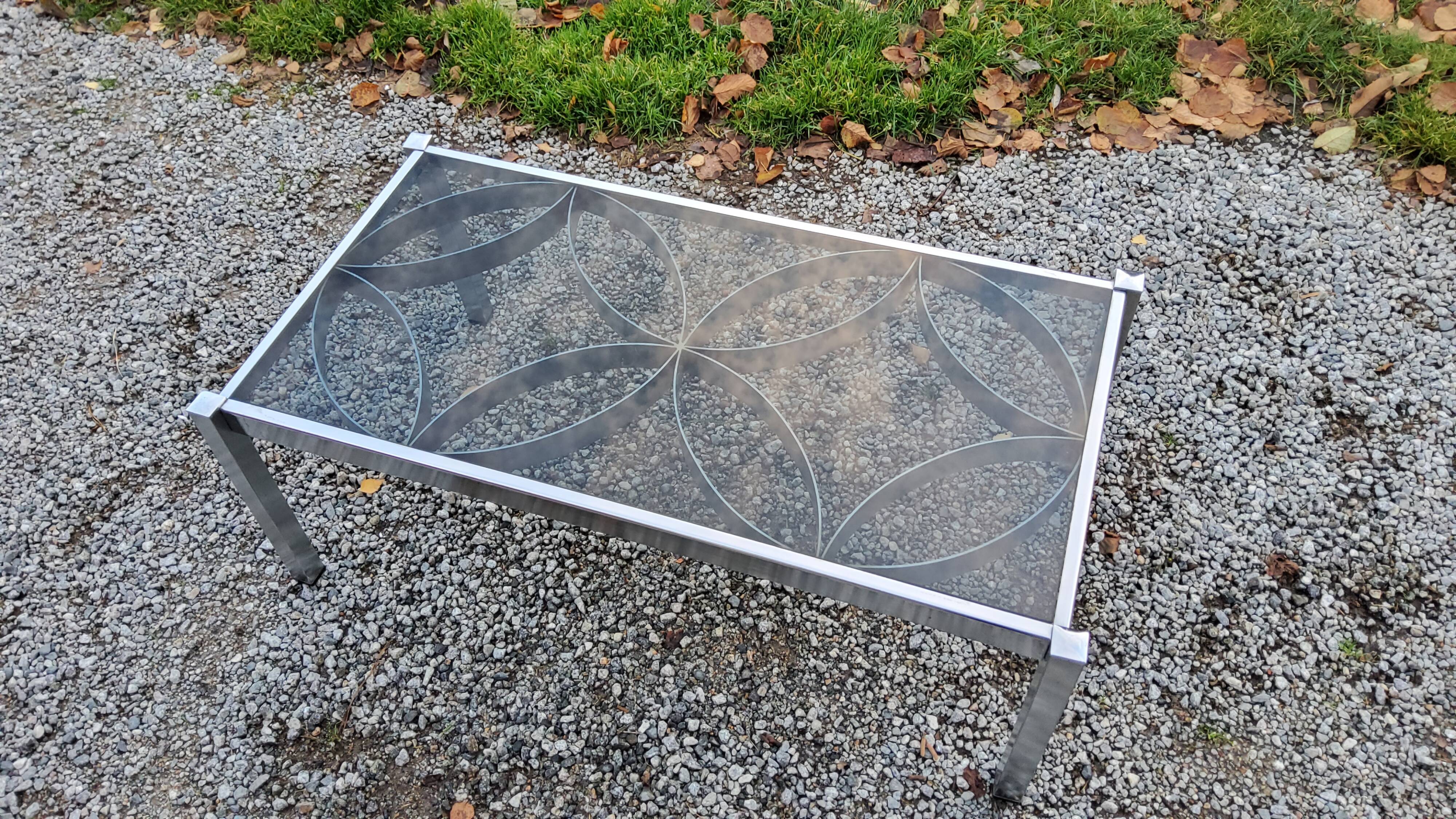 Coffee table from the 70s chrome and smoked glass