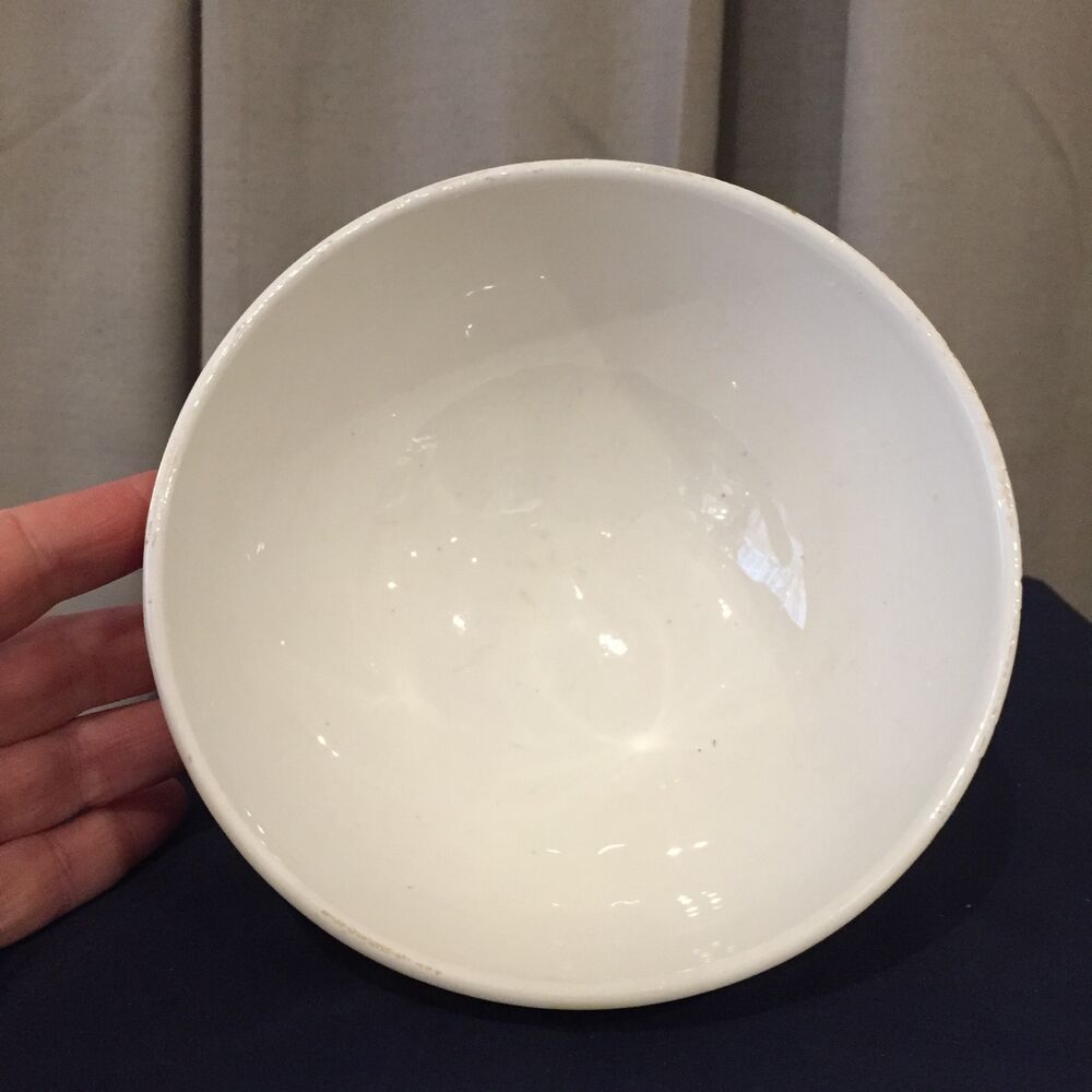 Faceted bowl white and orange digoin