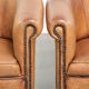 Set of two vintage sheepskin club armchairs with a beautiful light colour