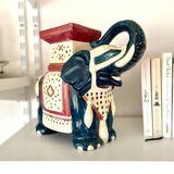 Blue and red ceramic elephant plant stand