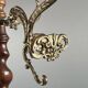 Twisted wooden coat rack with gilded bronze, 20th century