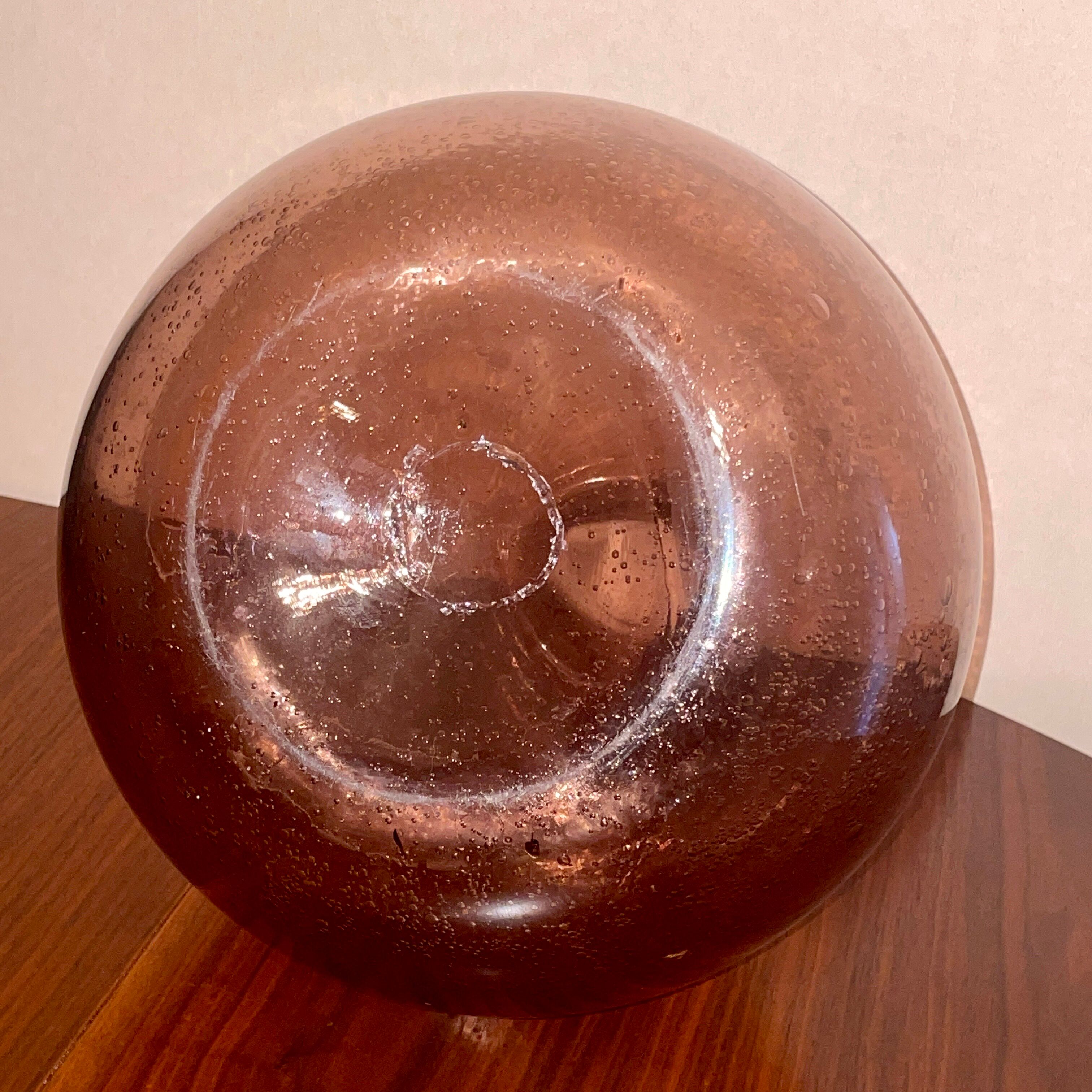 Bottle  in blown and bubbled glass
