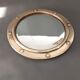 Witch porthole mirror 1940 in vintage gilded brass.