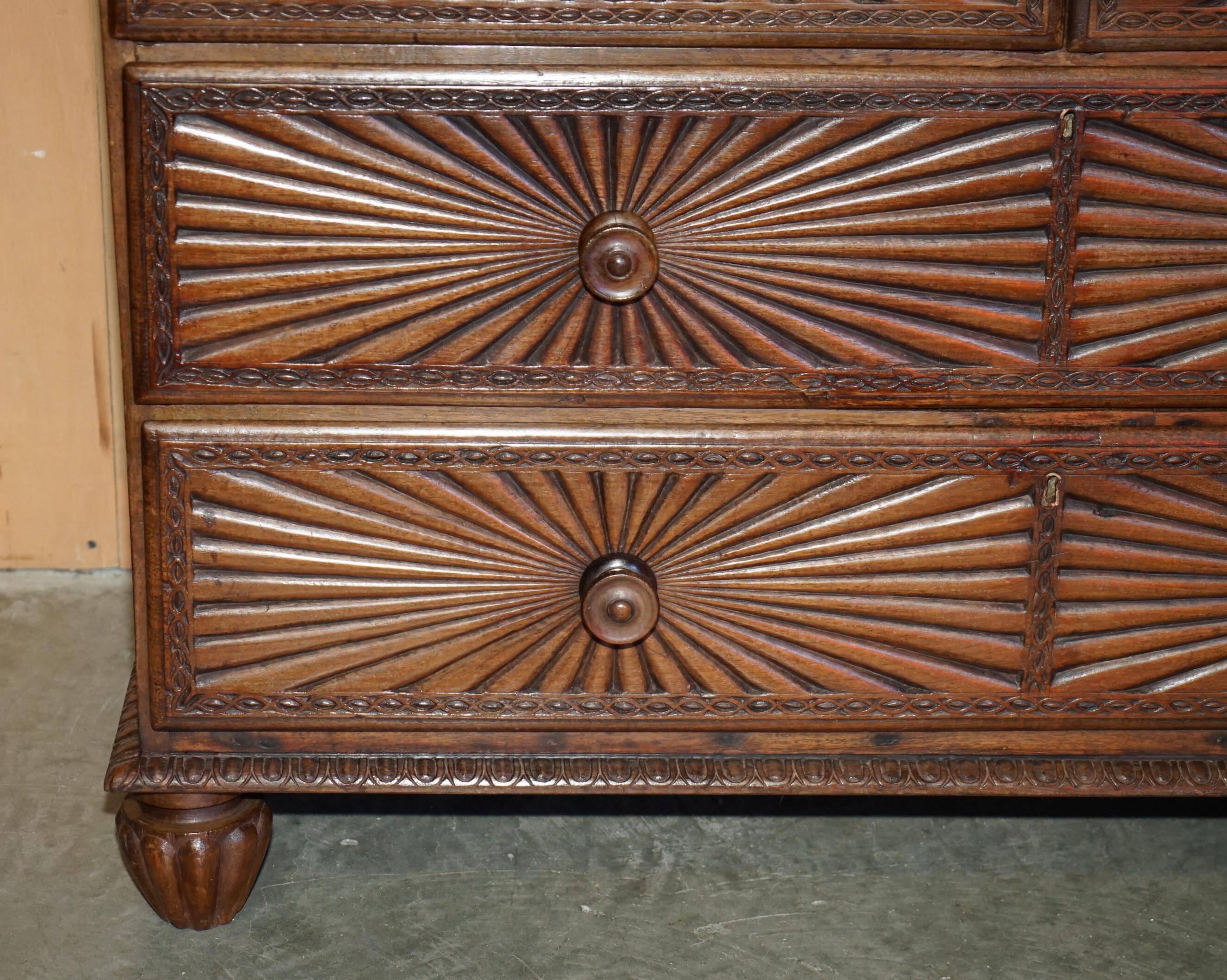 19th-century Anglo-Indian colonial hardwood library on a chest of drawers.
