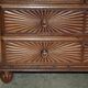 19th-century Anglo-Indian colonial hardwood library on a chest of drawers.