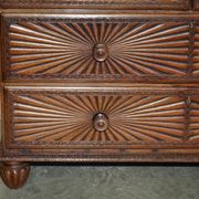 19th-century Anglo-Indian colonial hardwood library on a chest of drawers.
