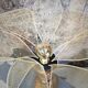 Table lamp, turned wooden foot, 8 rattan petals and golden mesh