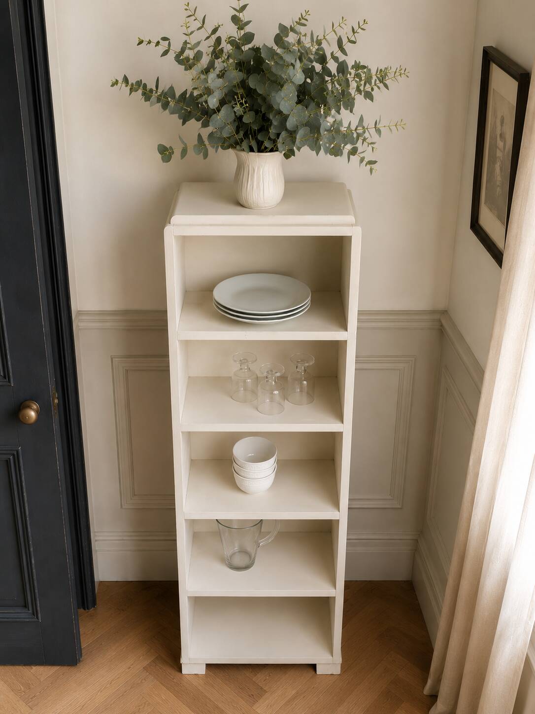 Renovated vintage 1950s library in beige.