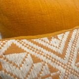 Square orange graphic cushion