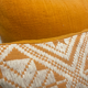 Square orange graphic cushion