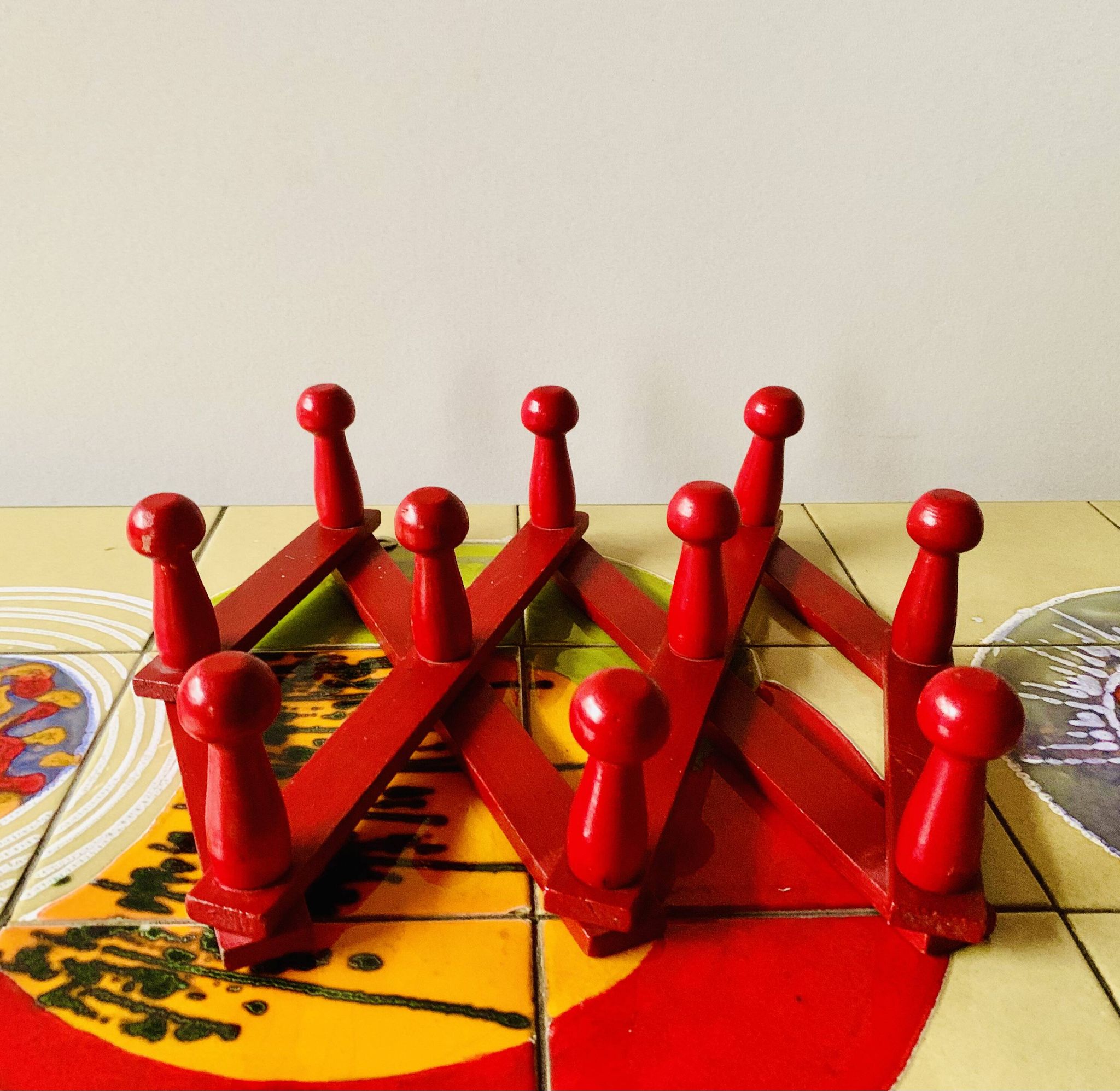 Vintage accordion coat rack in red painted wood