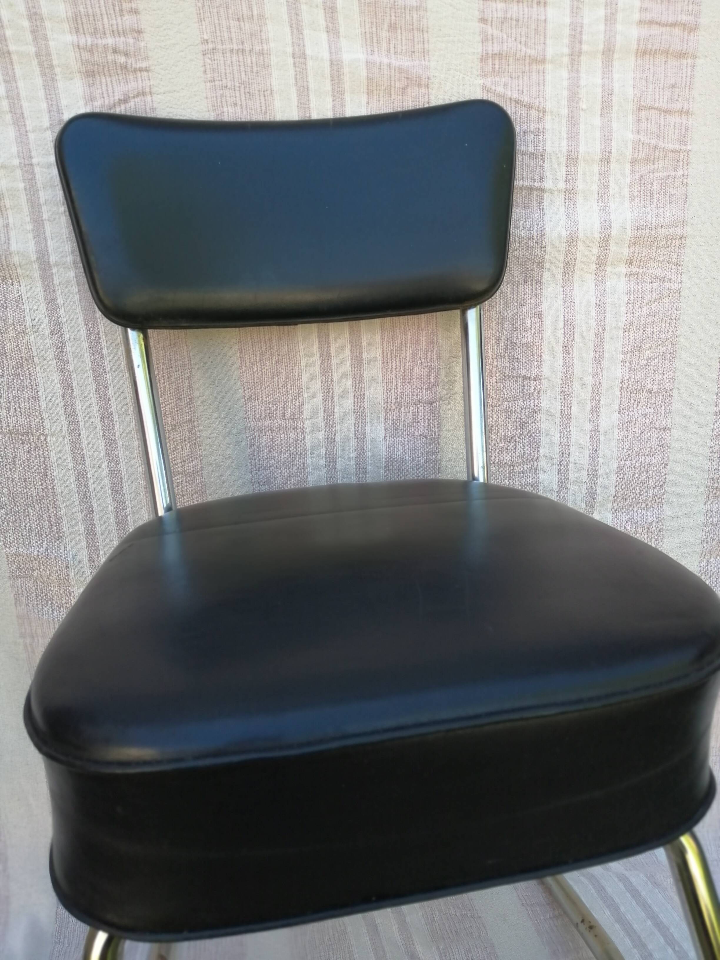 Chrome and skai industrial chair
