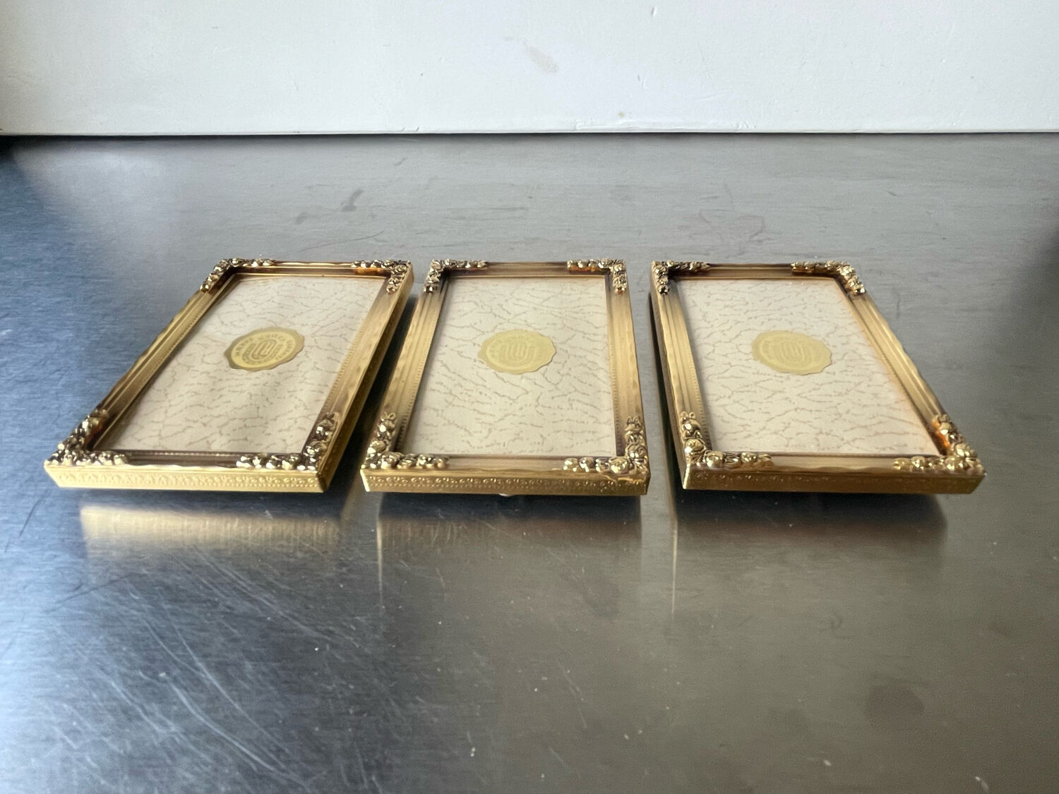 Set of 3 vintage identical gold colored metal picture frames convex glass