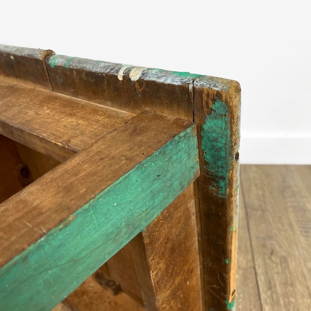 Old wooden slot stool