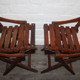 2 wooden folding chairs