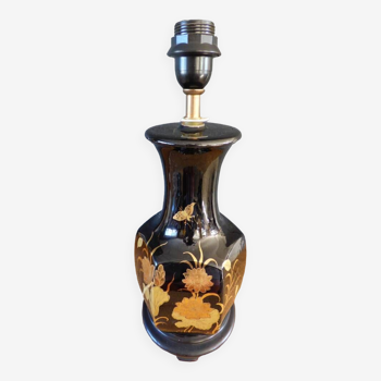 Black earthenware lamp base with handmade golden flower decoration