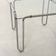 Italian vintage dining table with smooth glass and tubular frame base