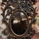 Antique Louis XV style mirror, richly carved with scrollwork, shells, and foliage.