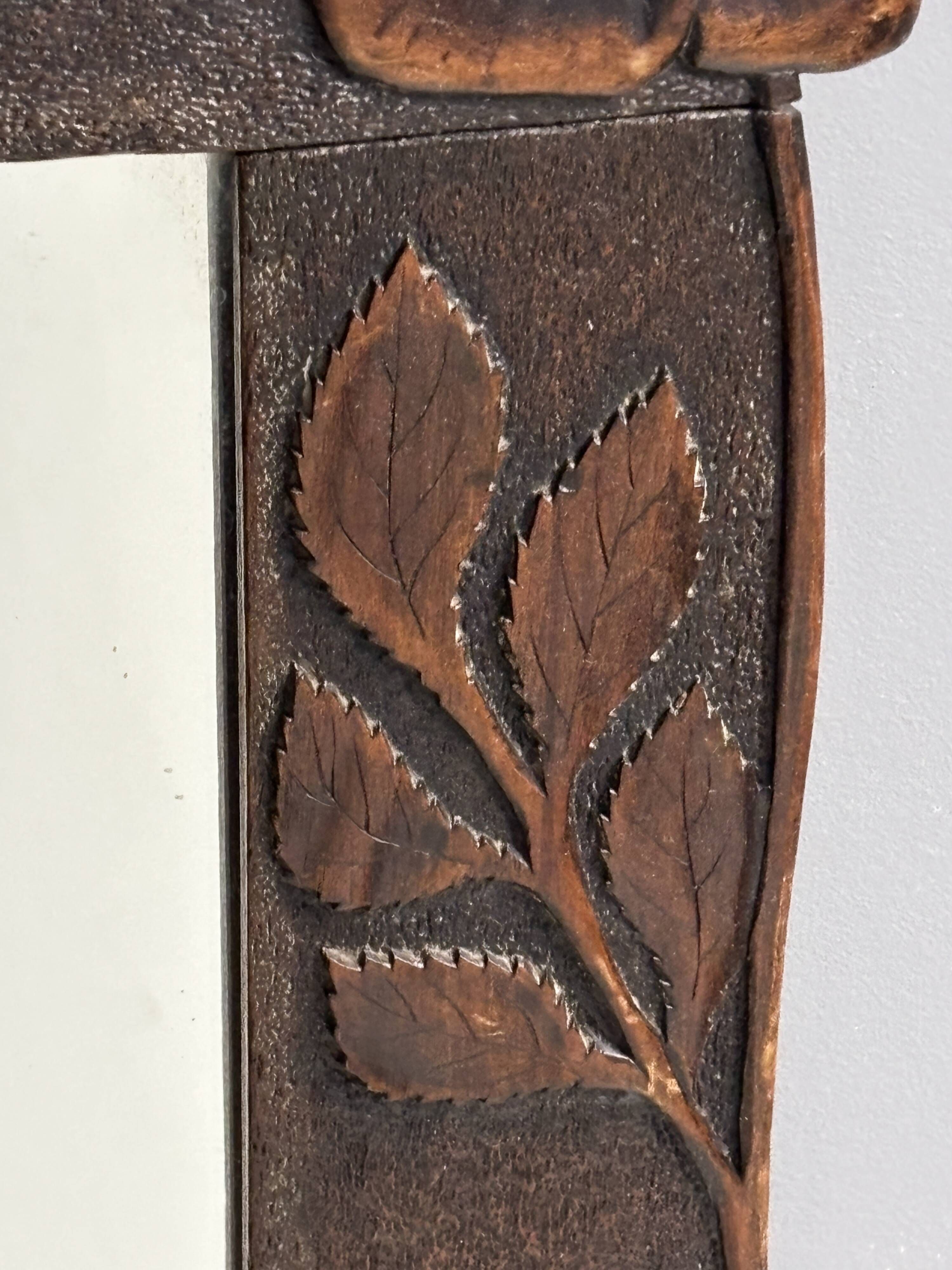Arts & Crafts hand-carved wall mirror with floral roses, early 20th century