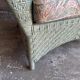 Vintage wicker lounge chair with pastel cushions – 1980s