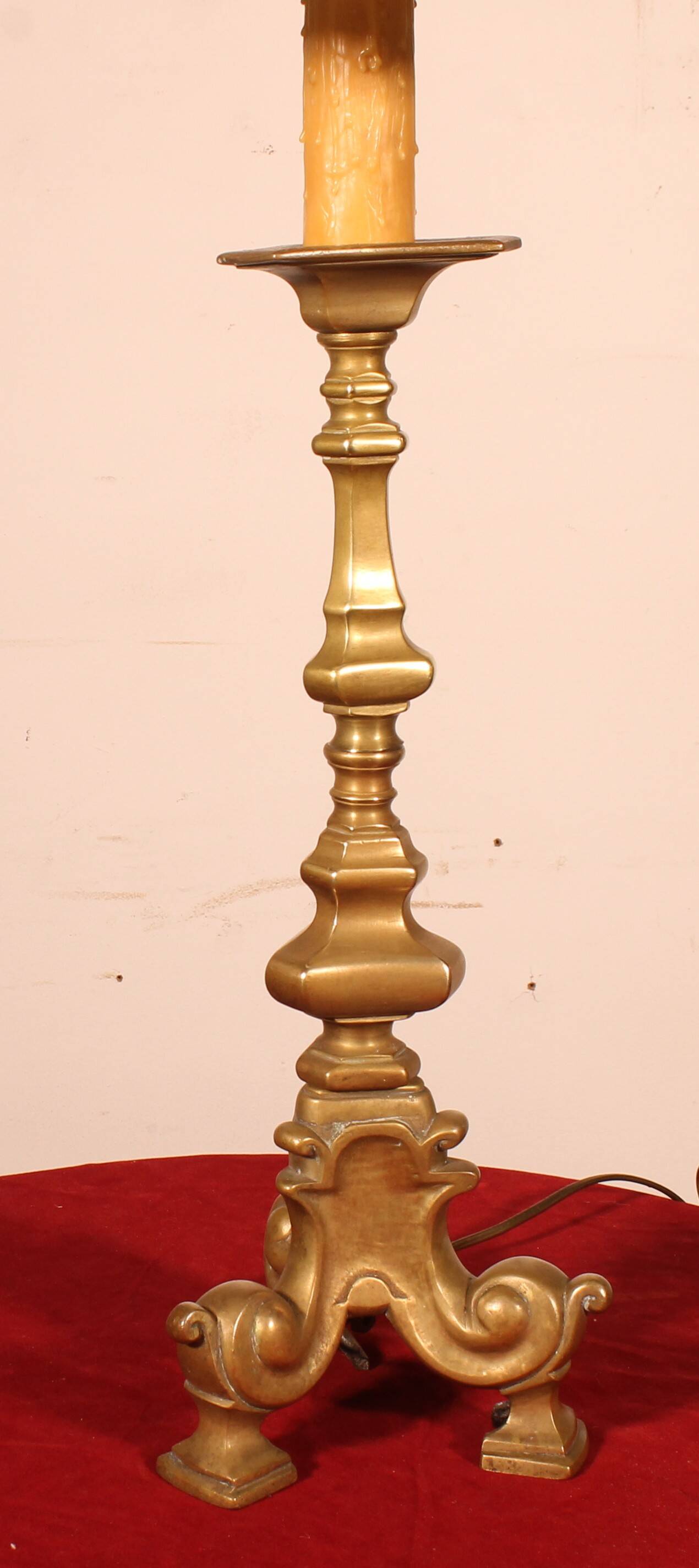 bronze candlestick from the 18th century converted into a lamp with its shade