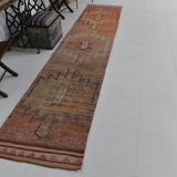 2x12 shades of pale orange vintage runner rug