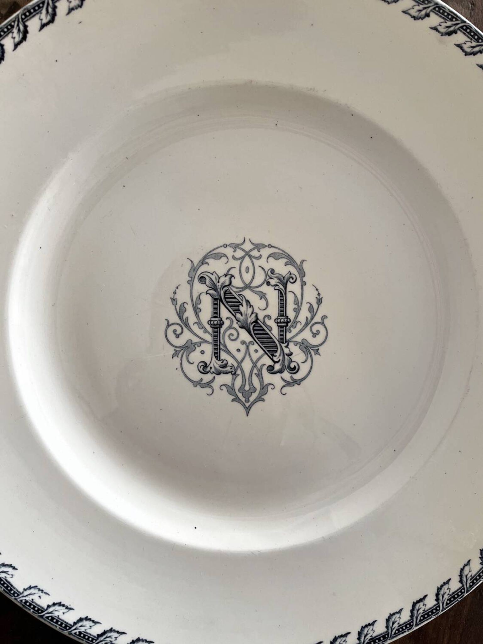 Round iron earth dish monogram “N” KG Lunéville
