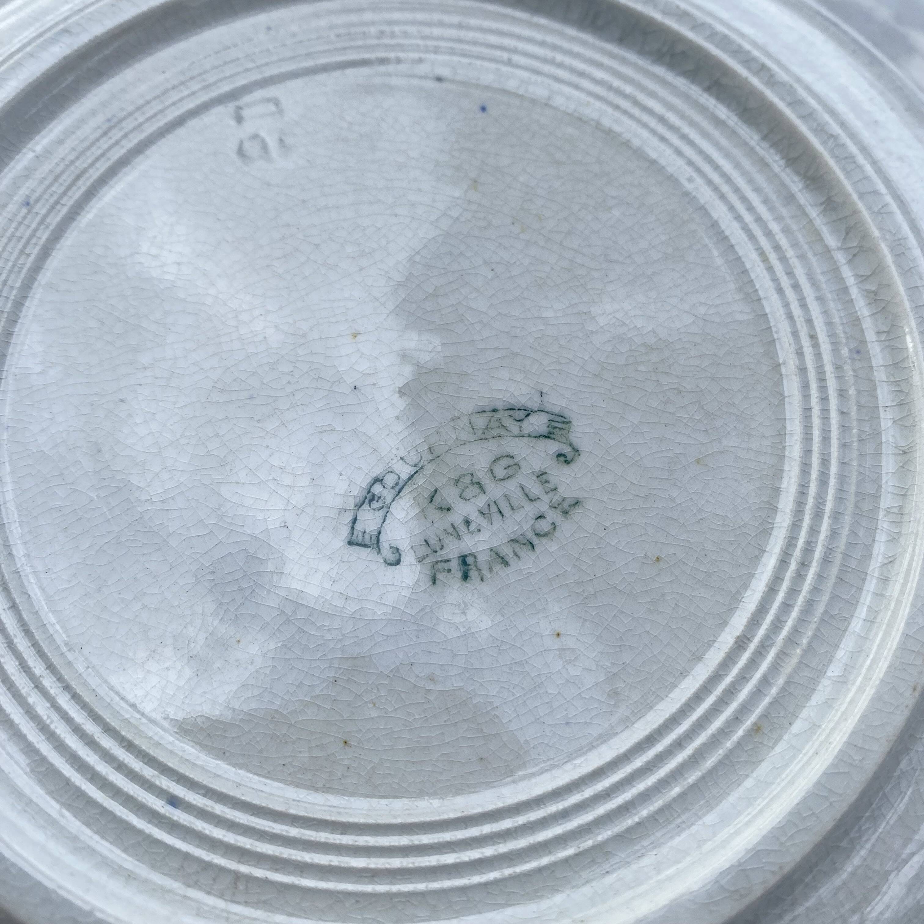 Cobalt blue floral deep plates from Lunéville.